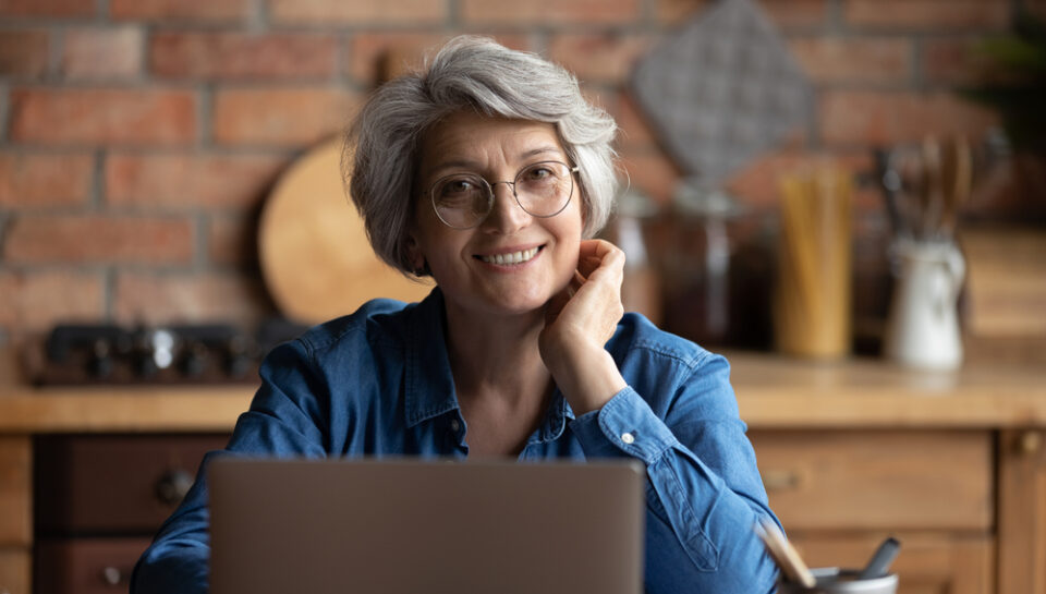 Headshot,Portrait,Of,Happy,Senior,Aged,Hispanic,Female,Sit,At